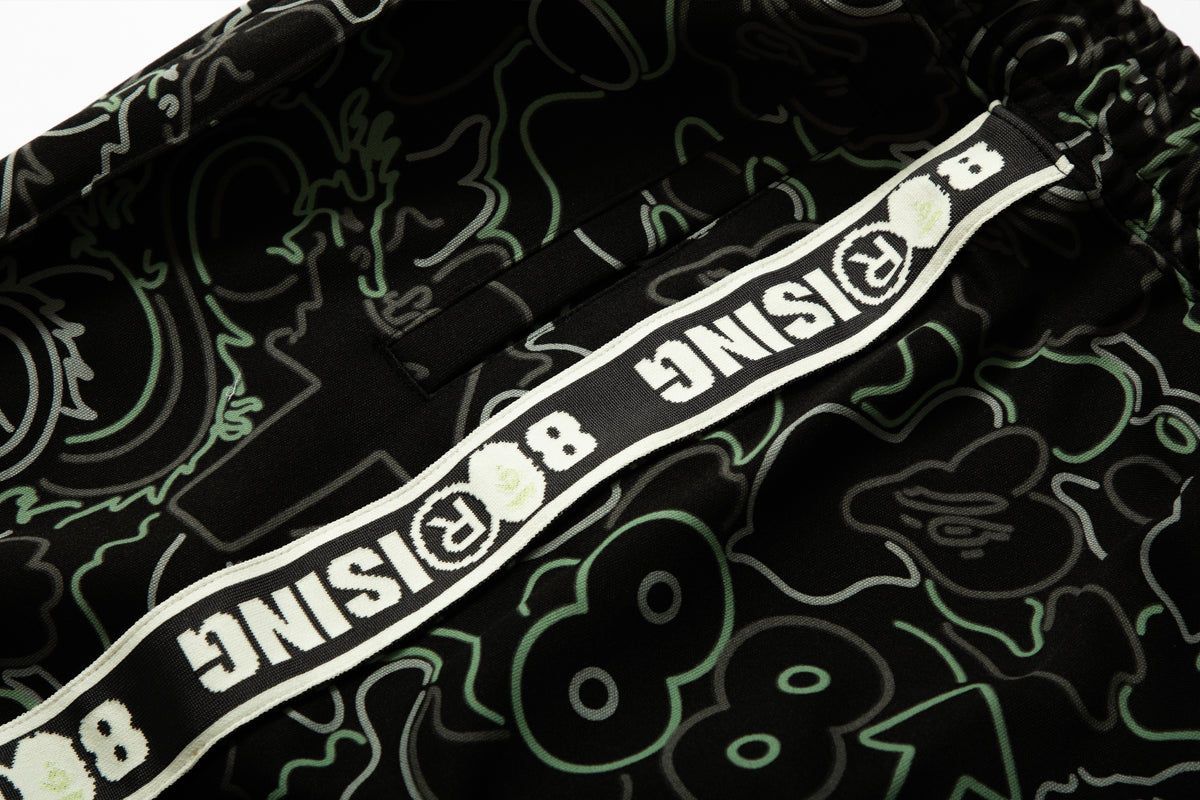 BAPE X 88RISING GLOW IN THE DARK CAMO TRACK PANTS