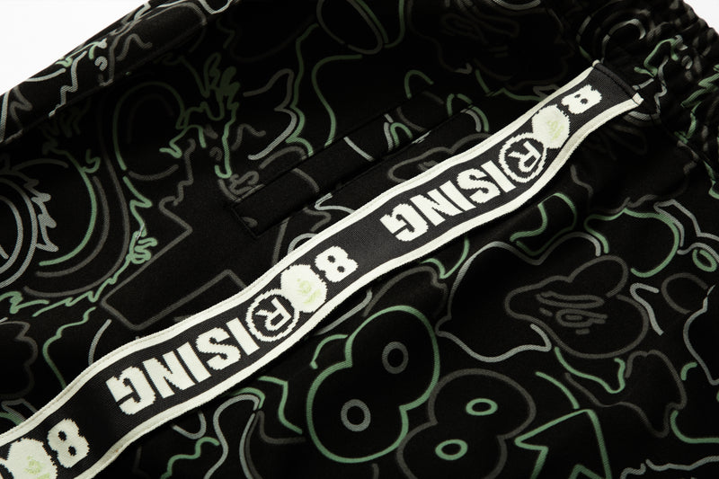 BAPE X 88RISING GLOW IN THE DARK CAMO TRACK PANTS